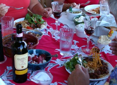 Joining the dark red Bimbo Sauce was a maple-fig dressed salad, bread, tapenade, dips, butter whipped with olive oil, and wine.