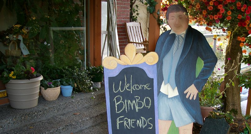 A plywood cutout of Don welcomes guests.