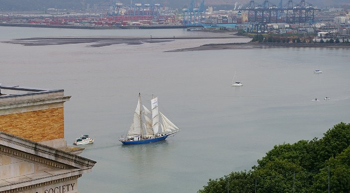 A Tall Ship sailing by the old Historical Museum and into the Thea Foss.