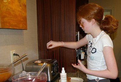 Bailee toasts a blueberry bagel at the Silver Cloud Bellevue (Eastgate) - photo.