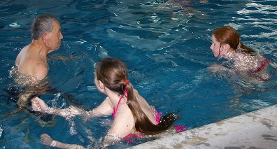 Caitlin and Bailee playing Marco Polo in Bally's pool - photo.