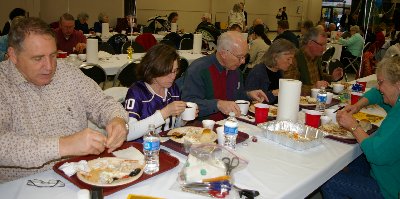 Our friends chow down on freshly cooked Dungeness Crab - photo.