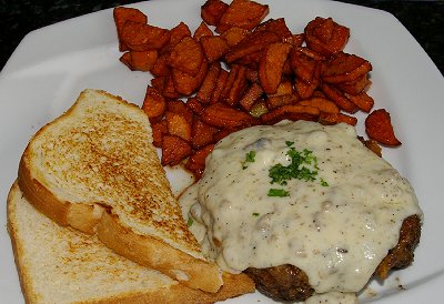 Chicken fried steak served at Dirty Oscar's Annex on 6th Avenue in Tacoma, Washington.