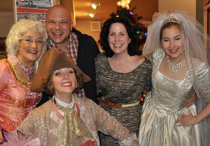 Rosalie Hilburn as the Fairy Godmother, Hilary Hinz as Prince Charming and Erin Herrick as Cinderella with two fans at the CenterStage in Federal Way.