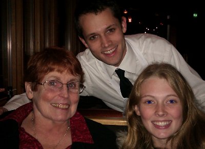 Our server Scott behind Peggy and granddaughter Vanessa at Anthony's Pier 66 in Seattle, Washington.