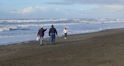 Donn, Rob, and Vickie walking on the beach - Ocean Shores Washington Adventure.