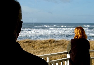 Mike Mowat and Debbie Irwin watching the waves - Ocean Shores Washington Adventure.