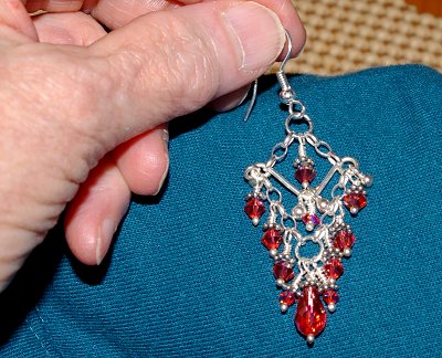 Peg Doman admiring beadwork by Jan Erb - Ocean Shores Washington Adventure.