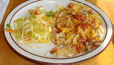 A plate of chicken and rice from the Funky Iguana Restaurant in Tacoma, WA.