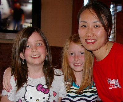 Two grandchildren at The Honey Pig Korean BBQ Tacoma, Washington.