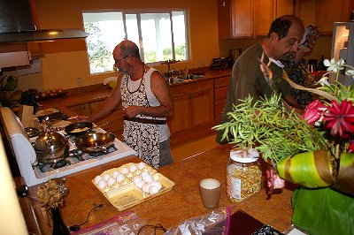 A group effort cooking for breakfast - Photo.