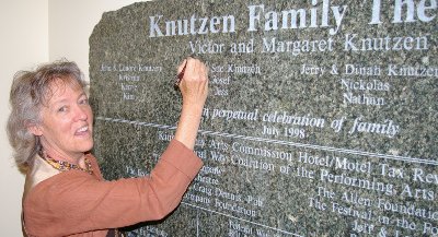 Jan autographing a sandblasted granite sign at the CenterStage in Federal Way, Washington.
