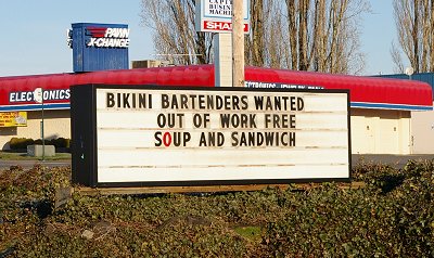 A roadside sign in Lacey, Washington - Photo.