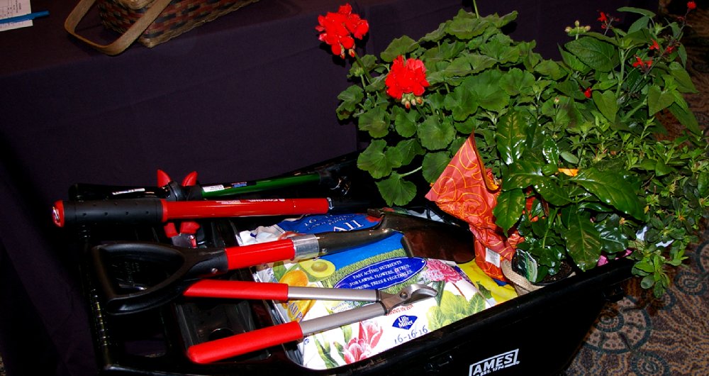 Garden utensils and soil from Nourish FISH Auction in Tacoma, Washington.