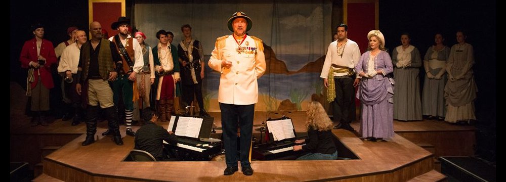 The Lakewood Playhouse company of The Pirates of Penzance featuring Gary Chambers as the Major General - PHOTO by TIM JOHNSTON - image.