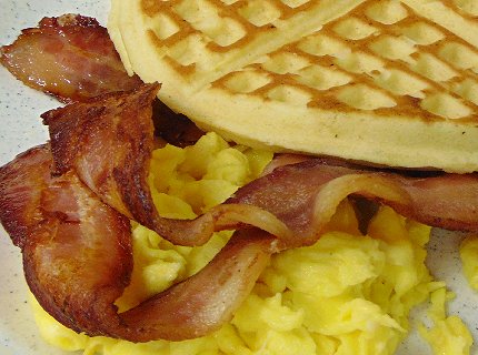 Bacon and eggs with waffle at Papa Eddies Cajun Cafe on South Tacoma Way.