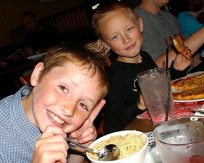 Riley and Jake enjoying their dinner from Mama Stortini's restaurant in Puyallup, Washington.