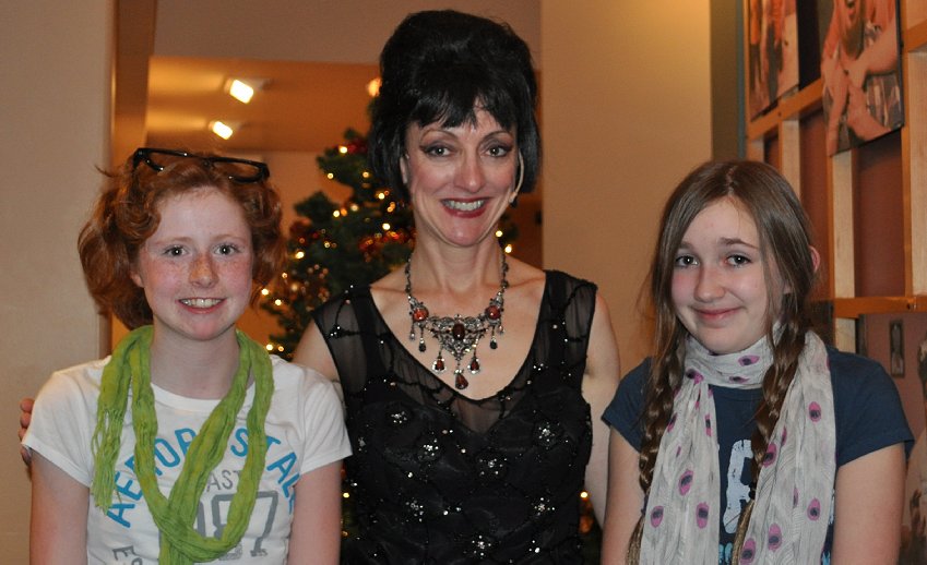 The two eldest granddaughters with Vuvuzela played by Sally Brady in Sleeping Beauty at the CenterStage Theatre in Federal Way, Washington - Photo.