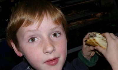 Riley enjoying his Philly Cheese sandwich at the deli Tacoma, Washington - Photo.