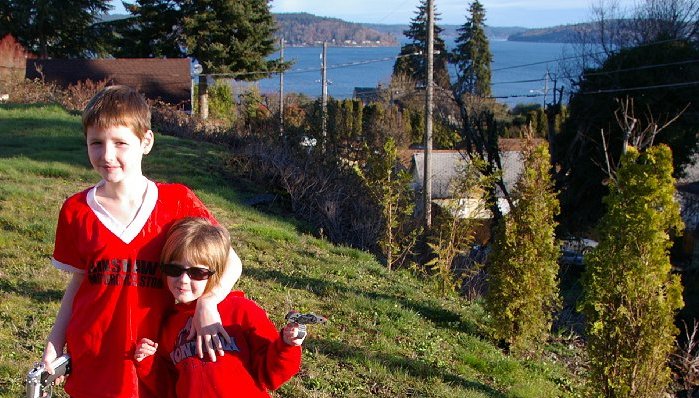Two of our little Red Rangers and the view of Vashon Island from our backyard in Tacoma, Washington - Photo.