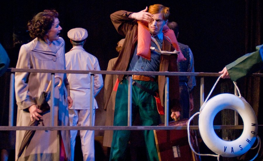 Theresa Holmes as poor Aunt Vy and Jerick Hoffer as Red on the ferry to Vashon Island - photo by Erik Stuhaug.