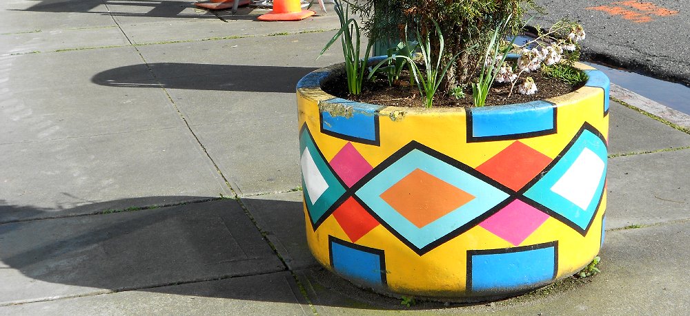 Colorful planters are on MLK just outside the Red Elm Cafe in Tacoma - image.