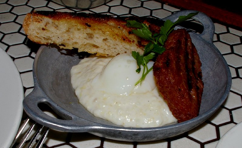 The Palace Kitchen's Berkshire Spam served with poached egg and grits.