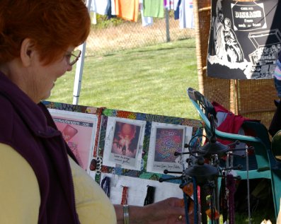 Peg Doman buying jewelry at the Urban Art Festival 2011.