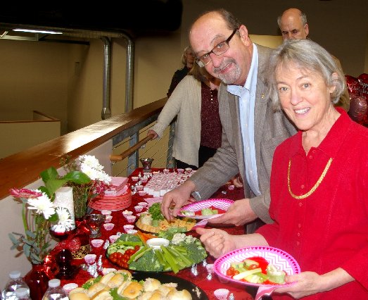 Donn Irwin and Jan Runbeck in the food line at Ted Brown Music in Tacoma - image.