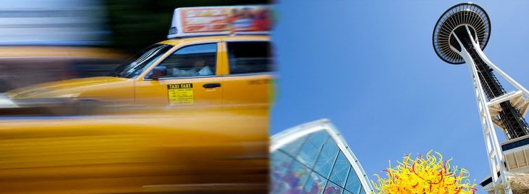 Orange Cab in flight from Seattle Center and the Chihuly Garden.