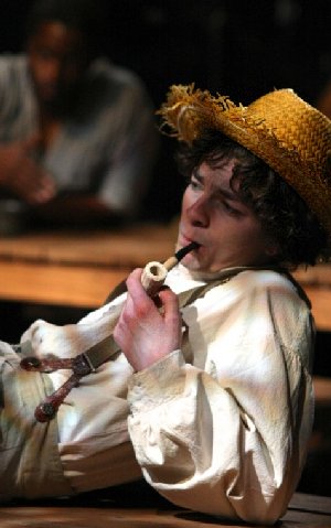 Christopher Morson with Geoffrey Simmons in the background from the Adventures of Huckleberry Finn at Book-It Repertory in Seattle, Washington - Photo by Alan Alabastro.