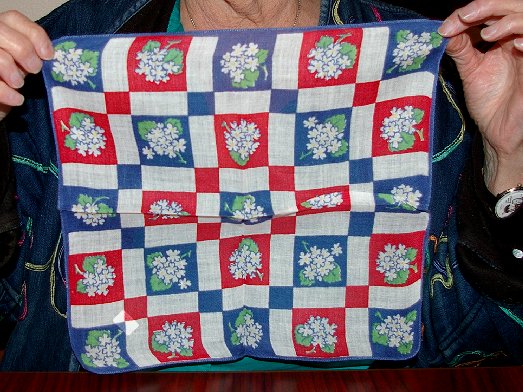 Peggy Doman showing off a new hanky for her collection while in Ocean Shores - image.