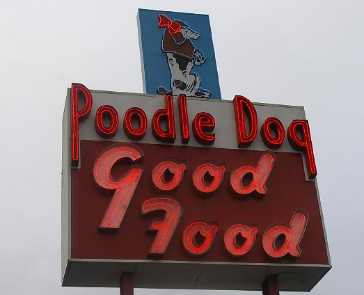 The neon sign for The Poodle Dog Restaurant Review in Fife - image.