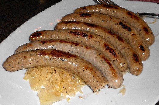 Six wursts over dry sauerkraut at Rhein Haus Restaurant Tacoma - image.