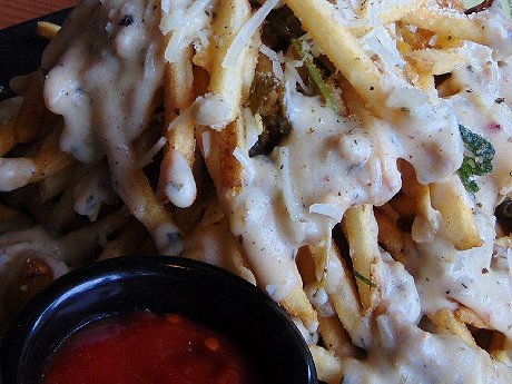 Dirty fries with sawmill gravy at Smoke + Cedar Restaurant in Tacoma - image.