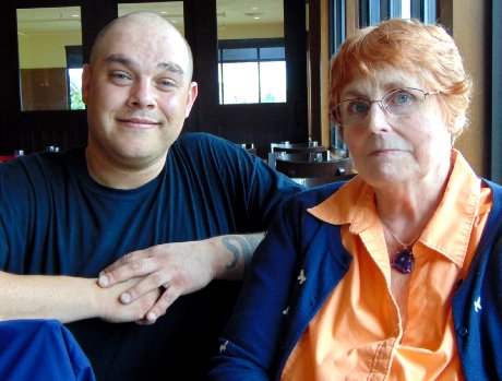 Server Joaquin and Peg Doman at Smoke + Cedar Restaurant in Tacoma - image.