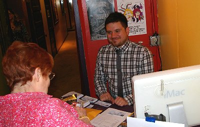 Paying for admission to the Seattle Fringe Festival in Seattle, Washington - Photo.