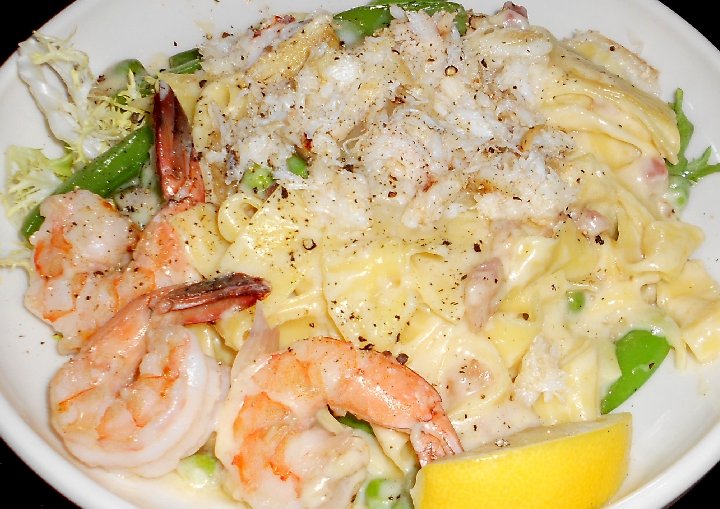 spring pasta - pappardelli with snow peas, crab, and prawns at Pacific Grill in Tacoma Washington - image.