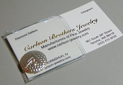 A Sterling Silver ball mark from Carlson Brothers Jewelry in Tacoma, Washington.